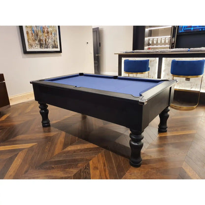Black pool table with blue cloth in a home bar