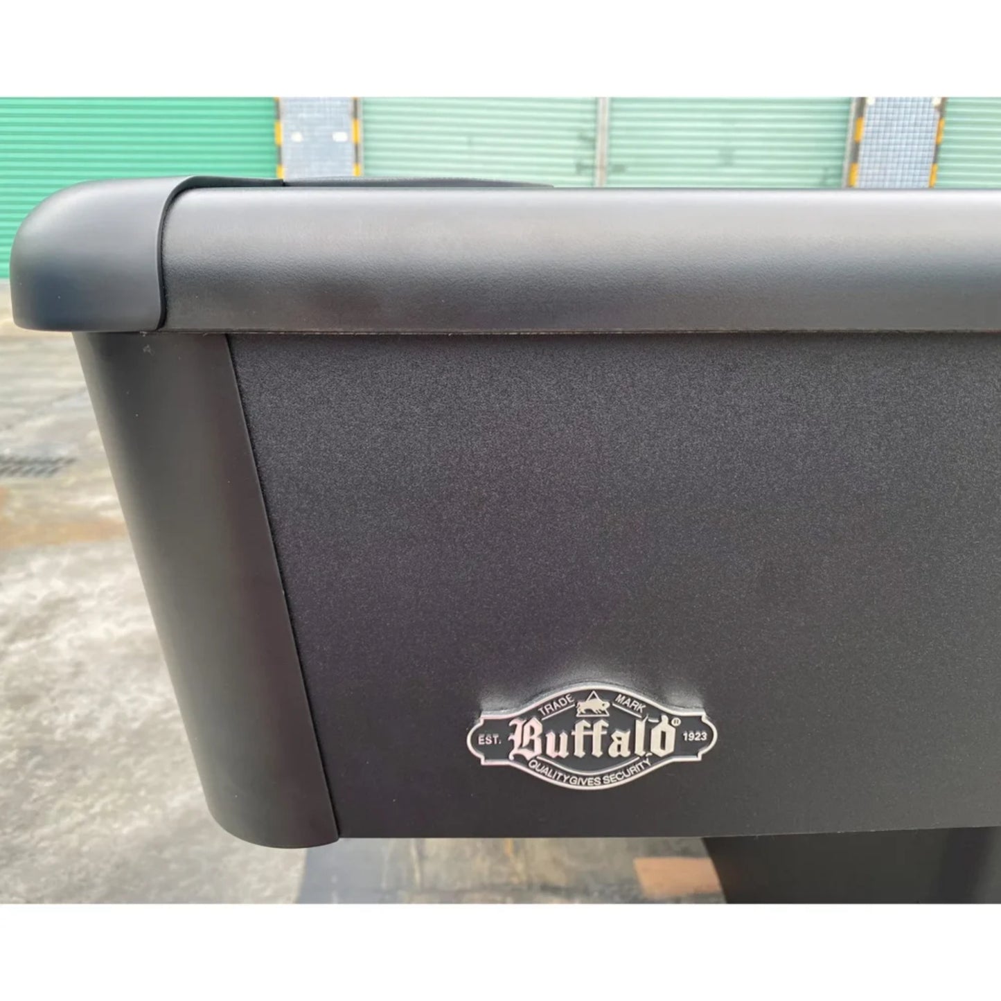 Corner of pool table cabinet with Buffalo logo 